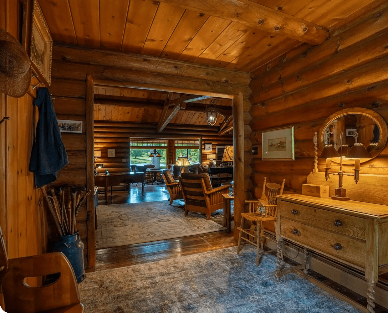 Cozy log cabin interior with wooden furniture.